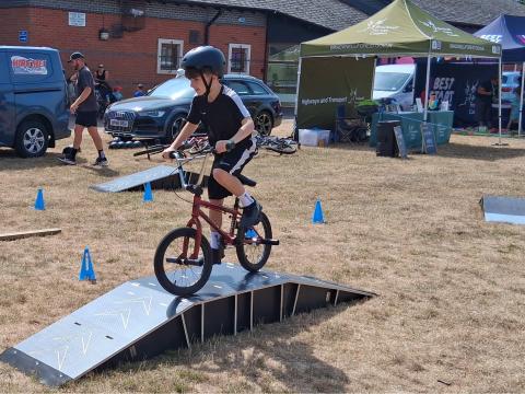 A child on a BMX ramp